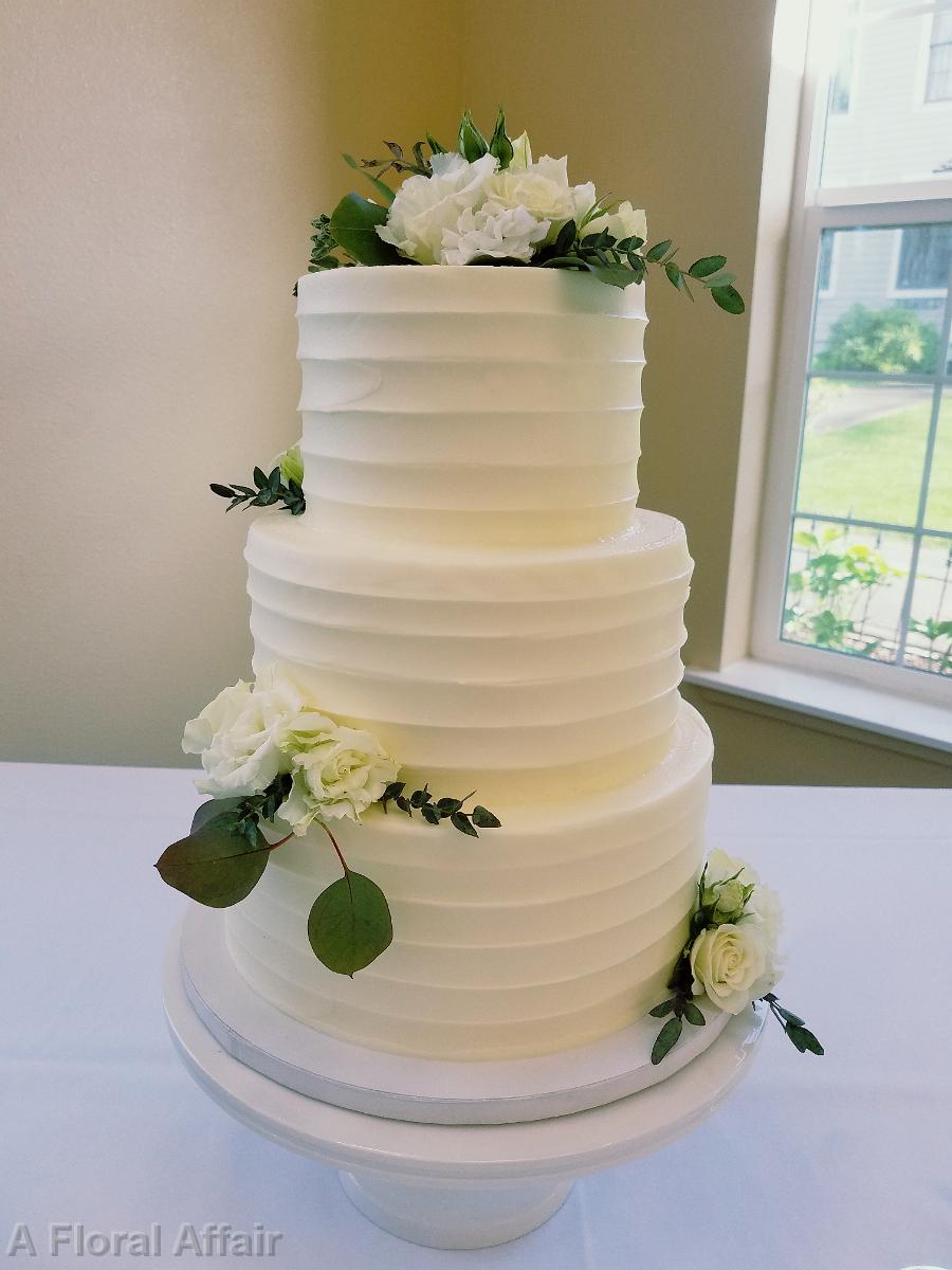 CA0186-White and Green Floral Accents on Wedding Cake