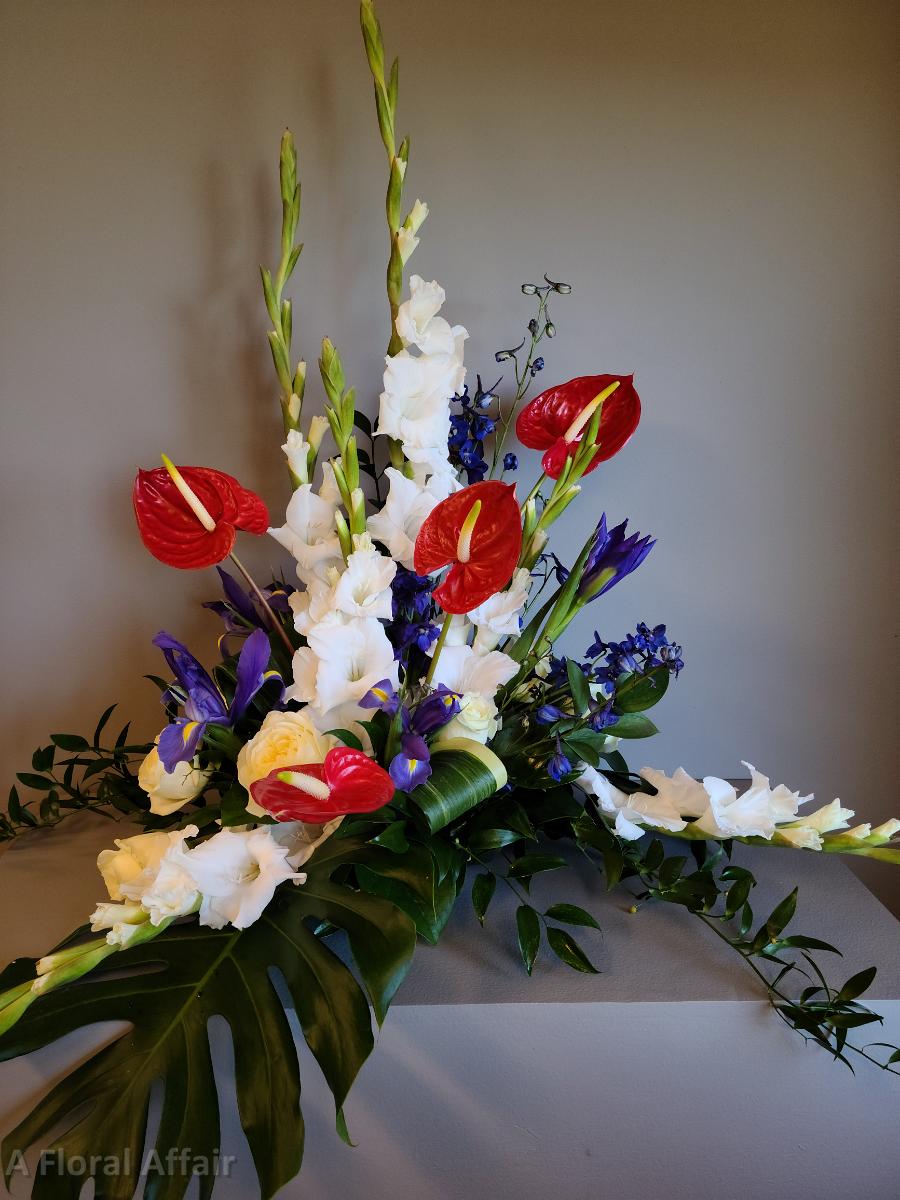 SY0078- Red, White, and Blue Custom Tropical Funeral Arrangement