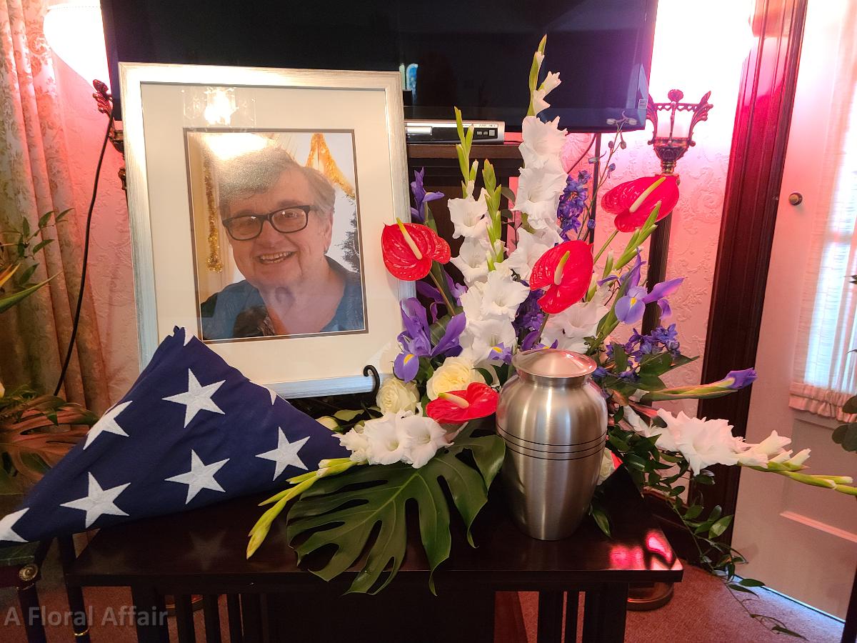 SY0080- Red, White, and Blue Custom Tropical Funeral Arrangement.