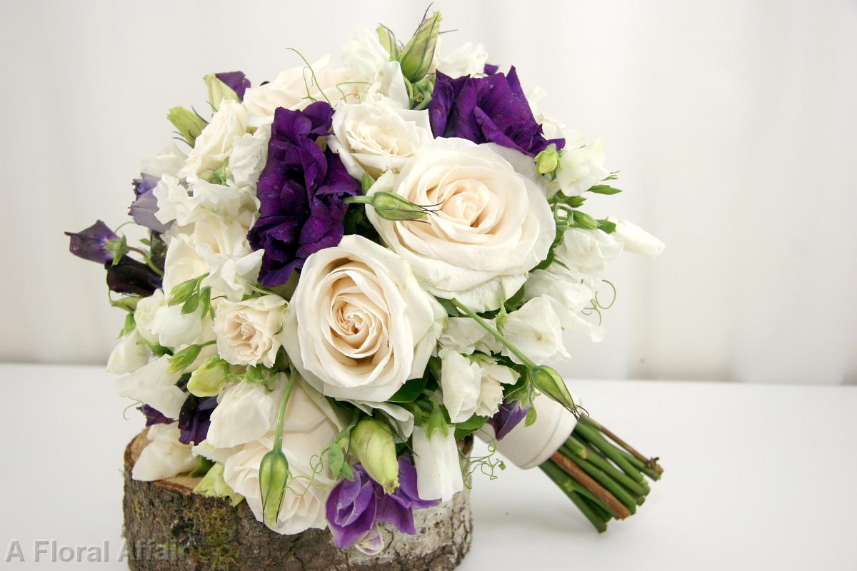 BB0793-Traditional Ivory and Purple Brides Bouquet