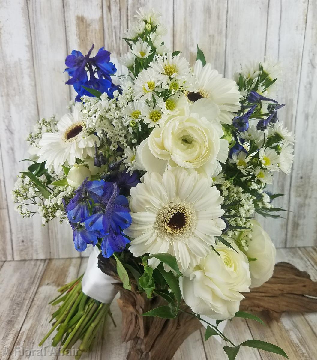 BB1473-White Gerbera Daisie, Ranunculas and Blue Belladonna Wedding Flowers