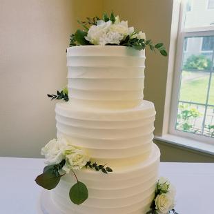 CA0186-White and Green Floral Accents on Wedding Cake