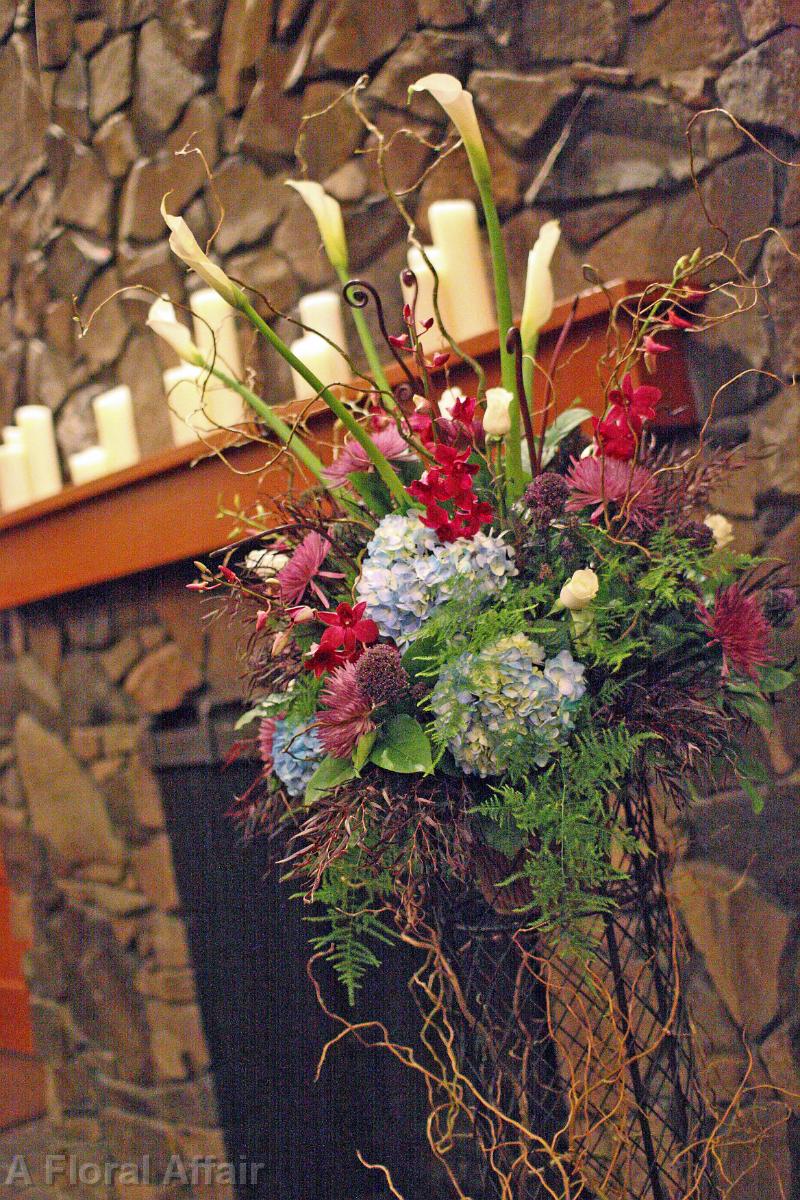 CF0498-Wedding Flowers In Front of Large Fireplace. JPG