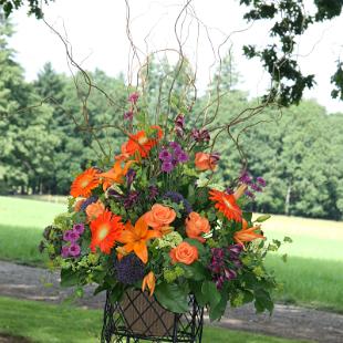 CF0508-Orange and Purple Outdoor Ceremony Wedding Arrangement