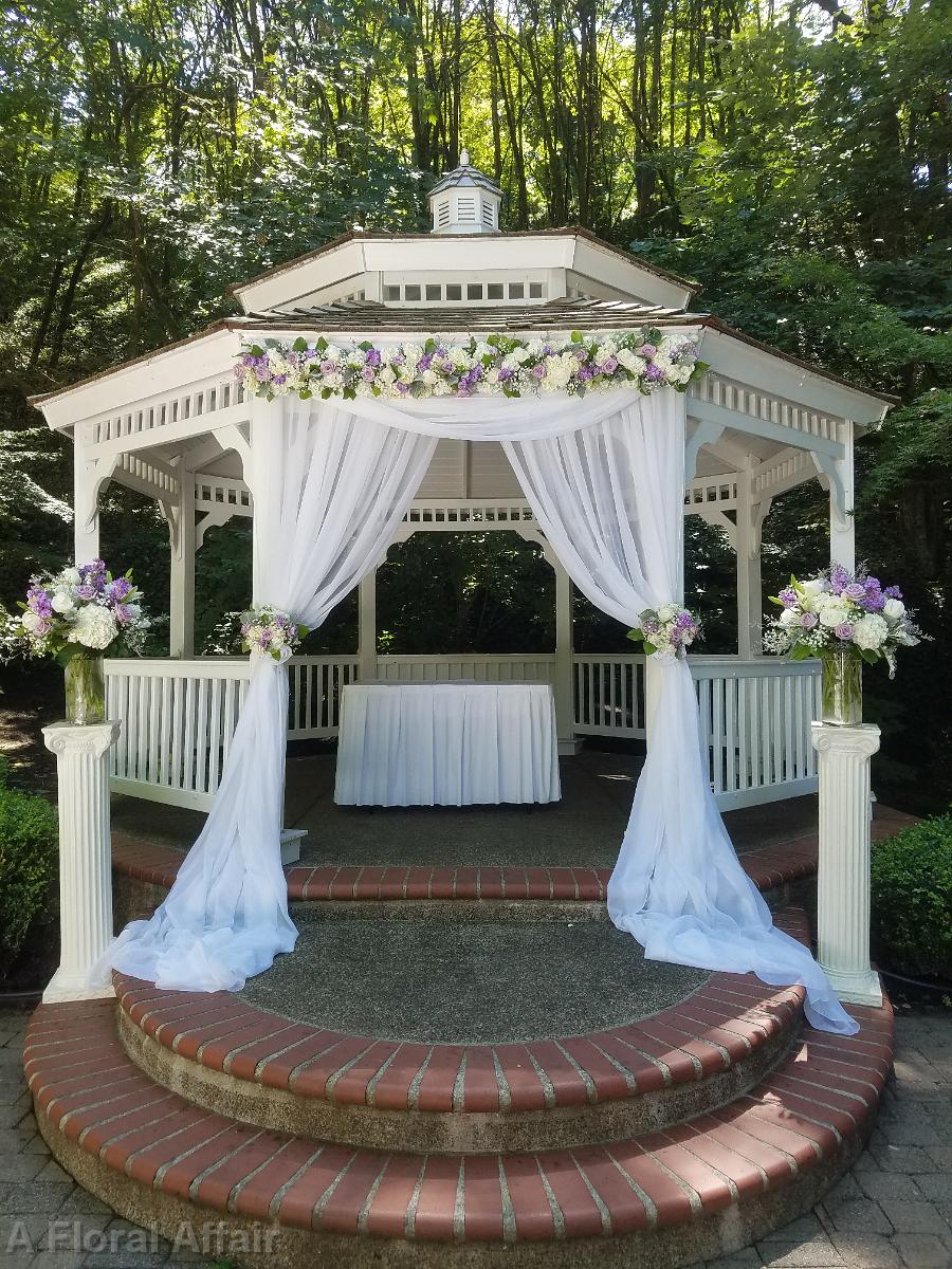 CF09247-Gazebo draped with chiffon and lavender and white floral