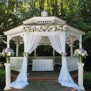 CF09247-Gazebo draped with chiffon and lavender and white floral