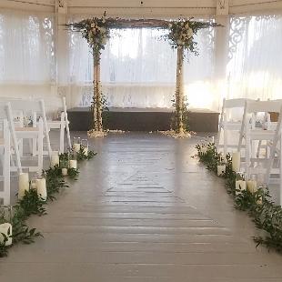 CF09288-Rustic Wedding Ceremony With Greenery and Candles Down Aisle