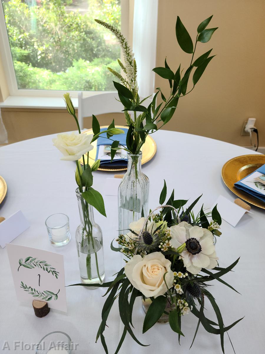 RF1510-Blue and White Vintage Bottle Centerpieces with Anemone and Roses
