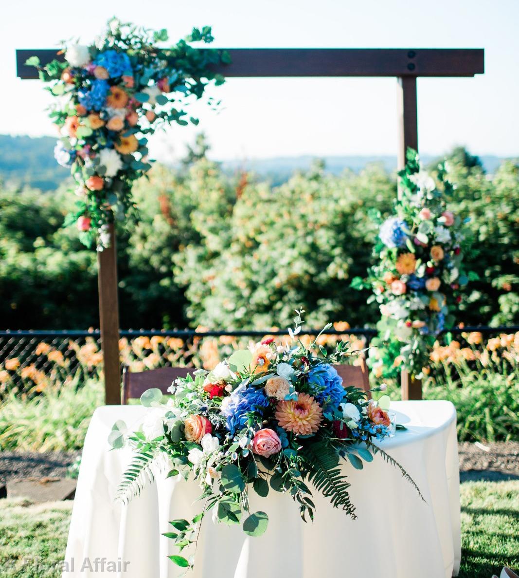 FT0761-Sweetheart Table Arrangement in Blues and Corals