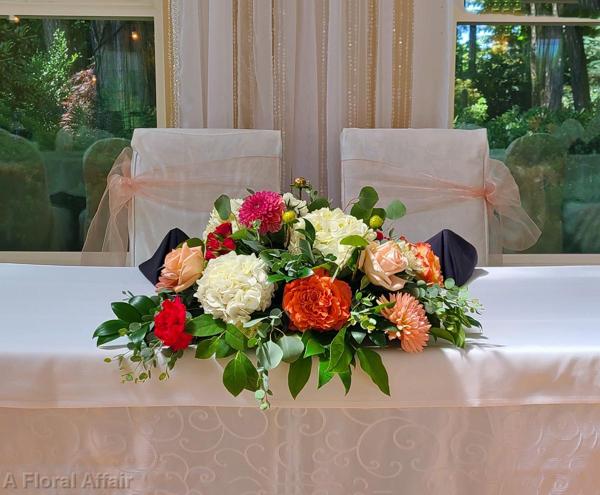 RF1536- Coral, Orange, and Peach Sweetheart Table Centerpiece