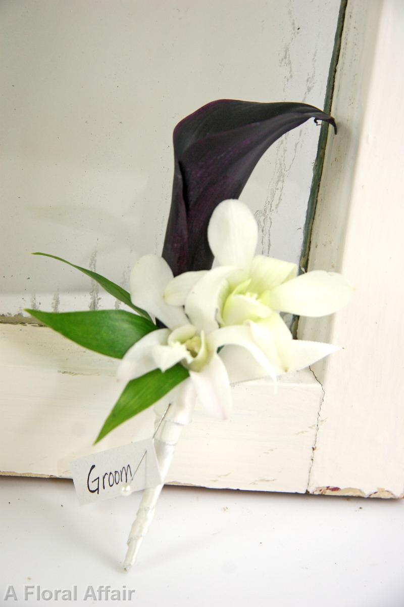 BF0615-Grooms Black Mini Calla and White Orchid Boutonniere