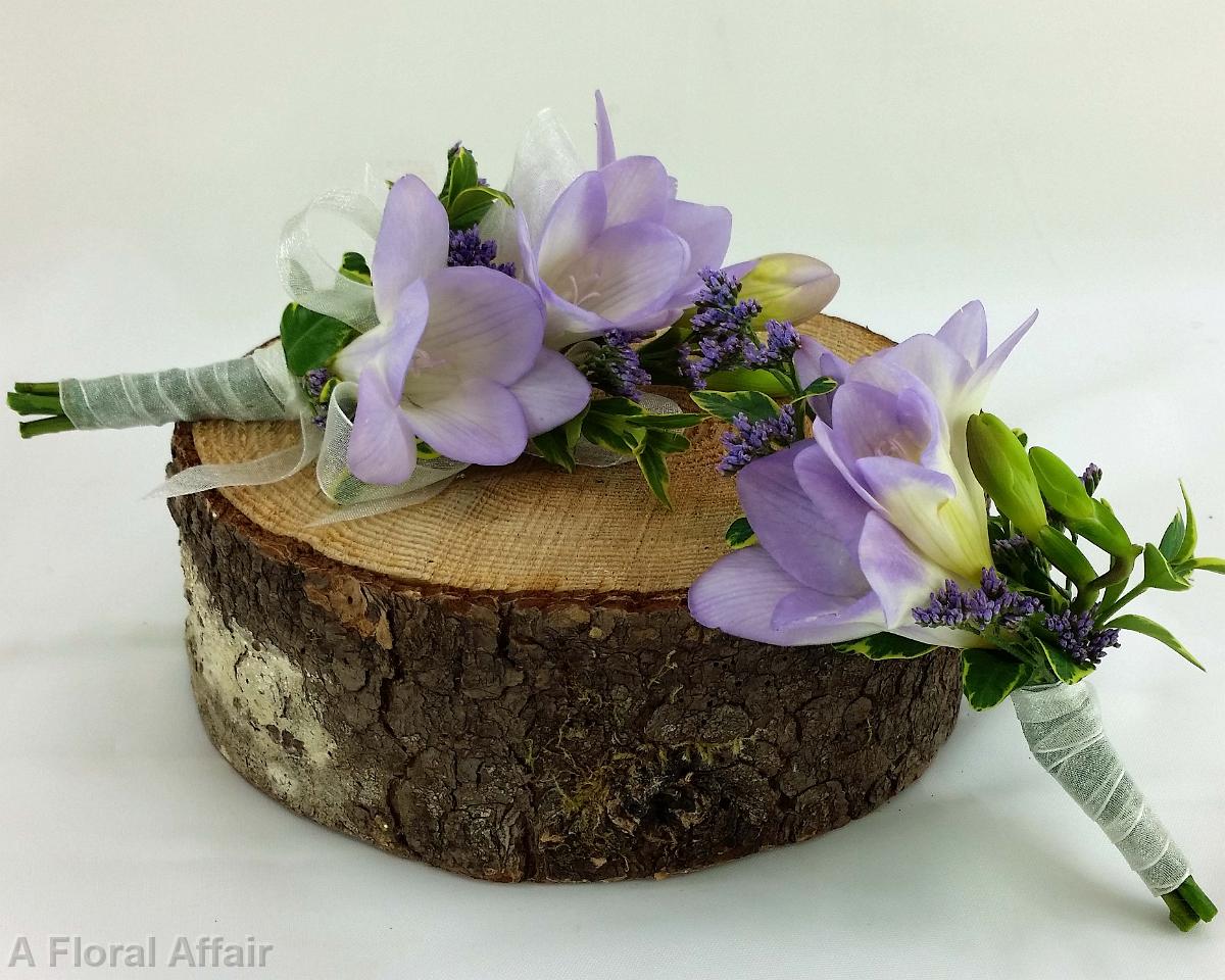 BF0685-Lavender freesia and misty blue boutonniere