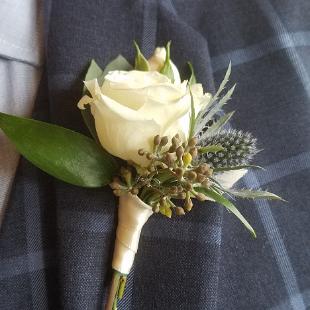 BF0779-Eryngium and White Spray Rose Boutonniere